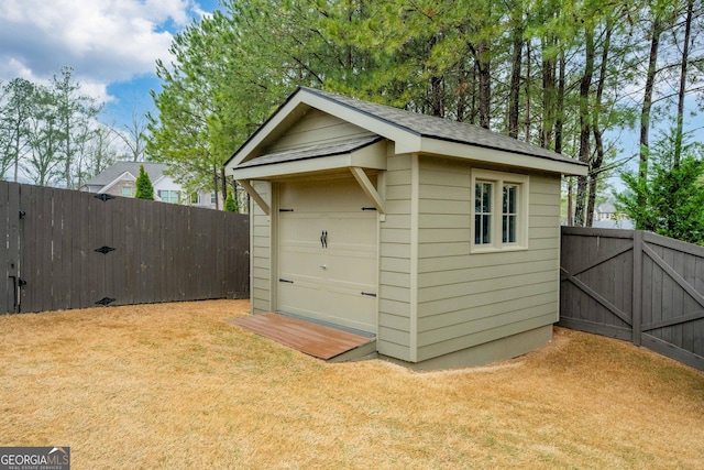 4030 Amberhill Cir, Cumming, GA 30040 - view of shed featuring a fenced backyard and a gate