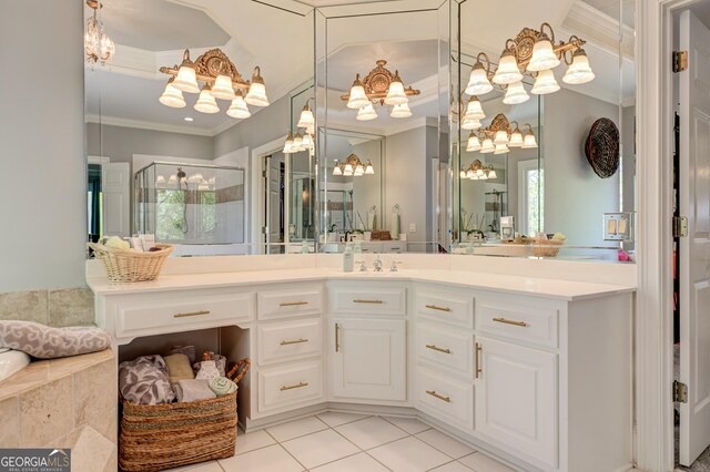 8155 Legends View Ct, Cumming, GA 30028 - full bathroom featuring ornamental molding, a chandelier, a shower stall, tile patterned flooring, and vanity