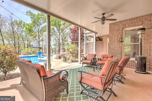 8155 Legends View Ct, Cumming, GA 30028 - view of patio with ceiling fan and an outdoor pool