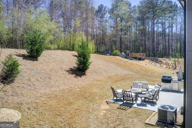 221 Sullivan St, Hampton, GA 30228 - view of yard featuring a patio and cooling unit