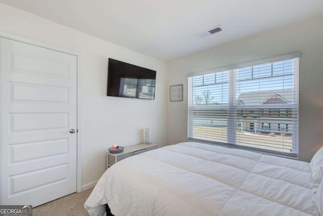 221 Sullivan St, Hampton, GA 30228 - carpeted bedroom featuring visible vents