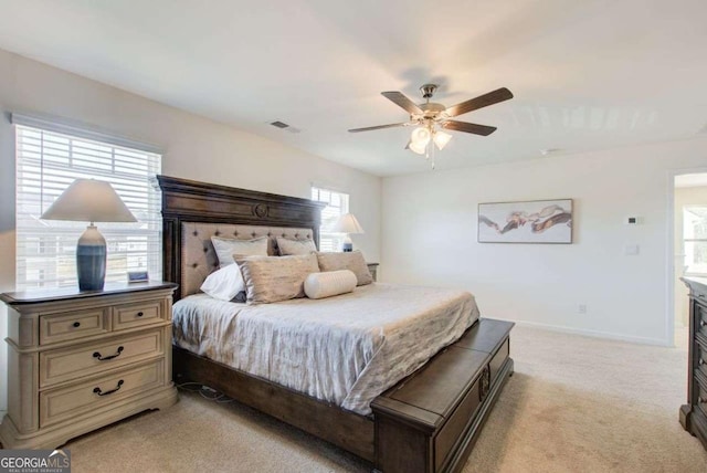 221 Sullivan St, Hampton, GA 30228 - bedroom featuring a ceiling fan, light carpet, baseboards, and visible vents