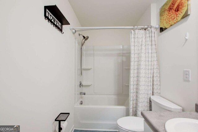 221 Sullivan St, Hampton, GA 30228 - bathroom with toilet, vanity, and shower / bathtub combination with curtain