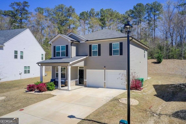 221 Sullivan St, Hampton, GA 30228 - view of front of house with stone siding, an attached garage, concrete driveway, a front yard, and a porch