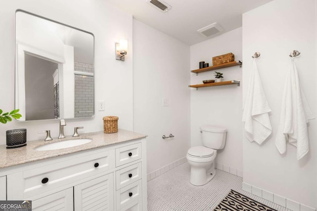 full bathroom with tile patterned flooring, vanity, toilet, baseboards, and visible vents
