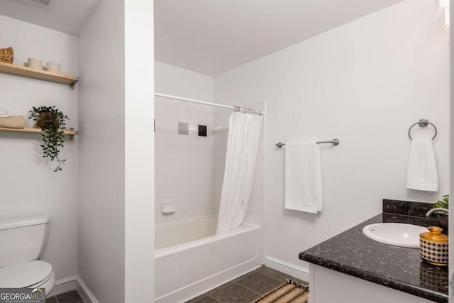 full bath with shower / bath combo, baseboards, toilet, tile patterned floors, and vanity