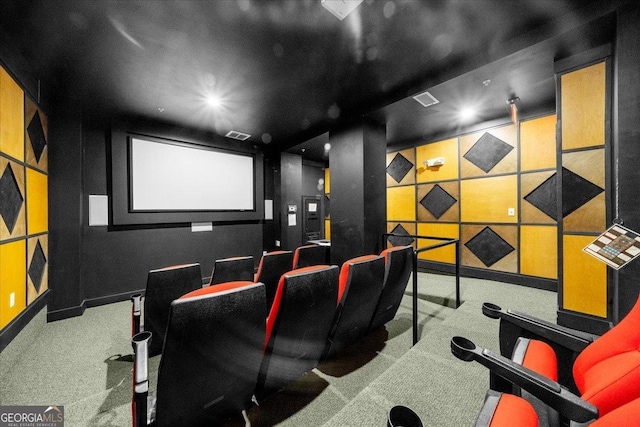 home theater with baseboards and carpet