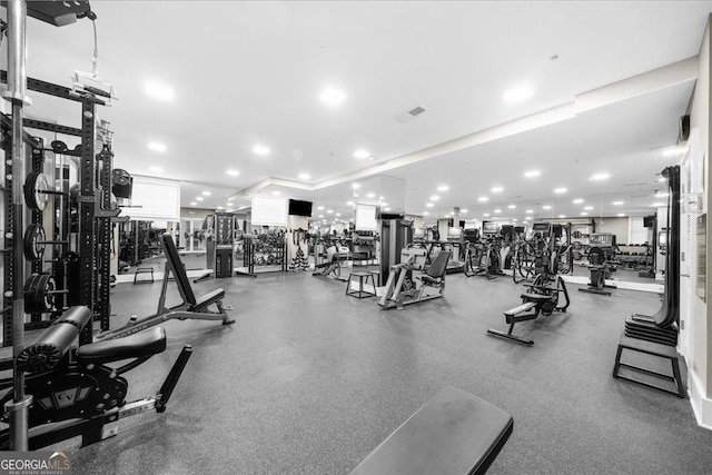 workout area featuring visible vents and recessed lighting
