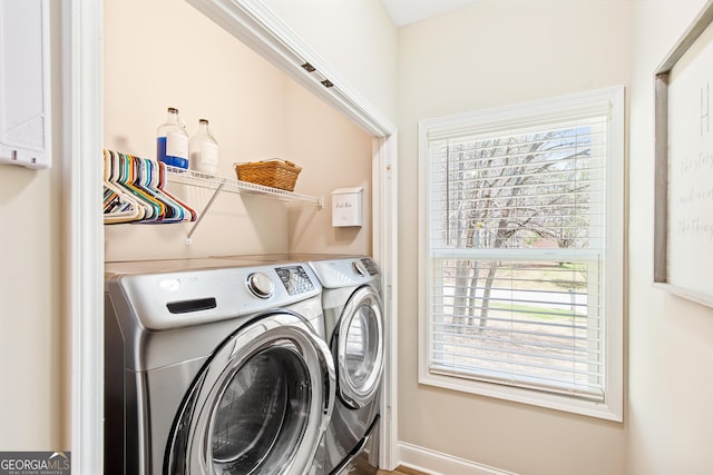 275 Cedars Glen Cir, Villa Rica, GA 30180 - laundry area with baseboards, washing machine and dryer, and laundry area