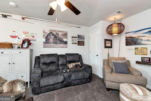 carpeted living room with visible vents, ceiling fan, and baseboards