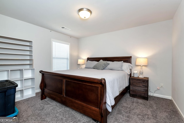 bedroom with visible vents, baseboards, and carpet floors