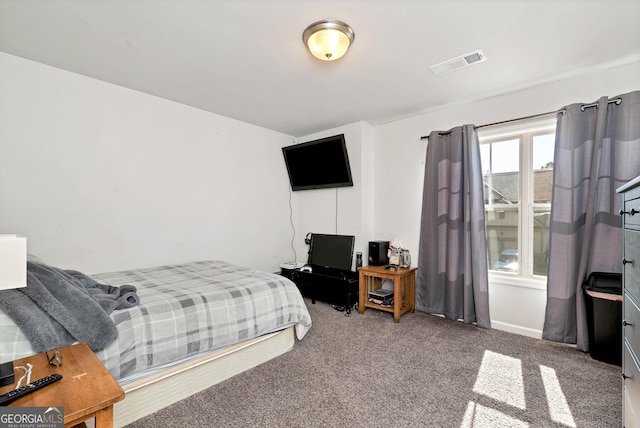 bedroom with carpet and visible vents