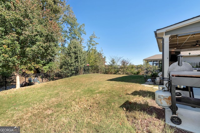 view of yard with a fenced backyard