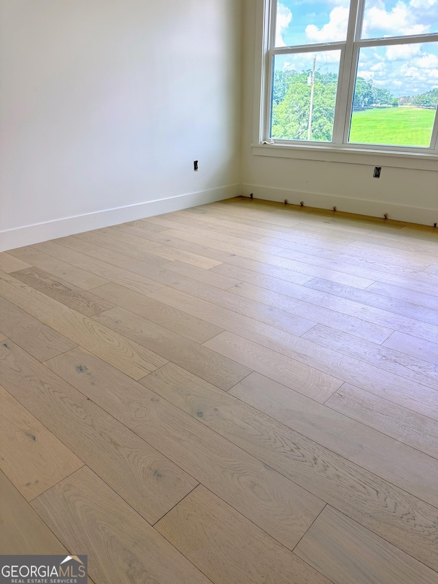 699 Rambler Inn Rd, Jefferson, GA 30549 - spare room featuring baseboards and light wood-style floors
