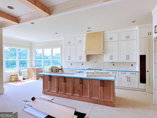 699 Rambler Inn Rd, Jefferson, GA 30549 - kitchen featuring white cabinetry, a kitchen island, decorative backsplash, recessed lighting, and beamed ceiling