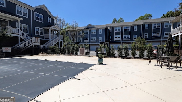 234 Carlyle Park Dr NE, Atlanta, GA 30307 - view of community with a patio, stairway, fence, and a residential view