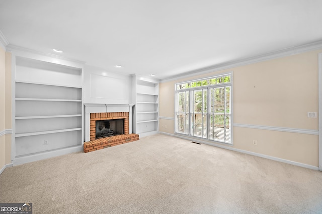unfurnished living room featuring baseboards, ornamental molding, visible vents, and carpet