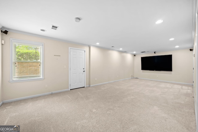 535 Woodbrook Way, Lawrenceville, GA 30043 - unfurnished living room featuring light carpet, recessed lighting, and crown molding