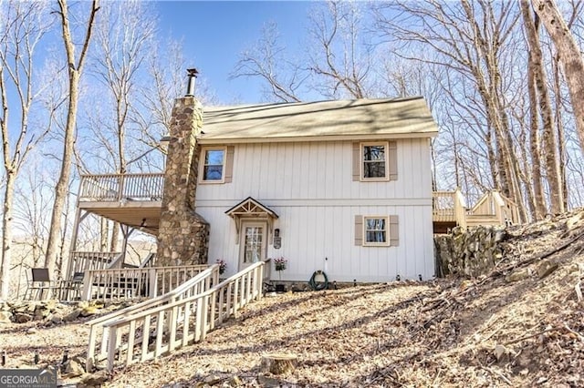 1006 Chestnut Cove Trl, Jasper, GA 30143 - chalet / cabin featuring a wooden deck, a chimney, and a balcony
