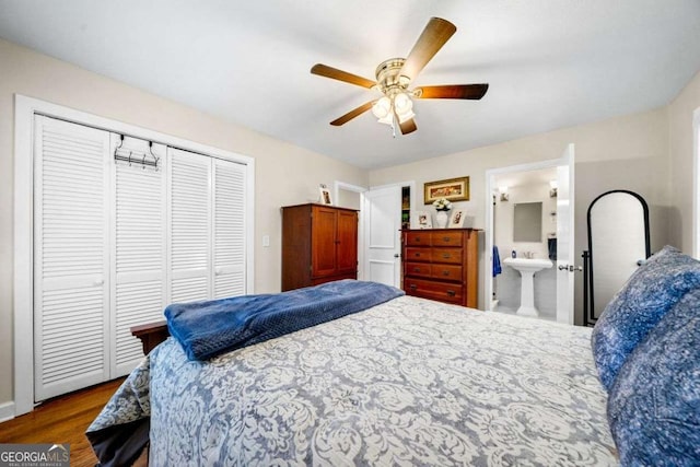 1505 Robinhood Trl, Gainesville, GA 30501 - bedroom featuring a closet, wood finished floors, ceiling fan, and ensuite bathroom