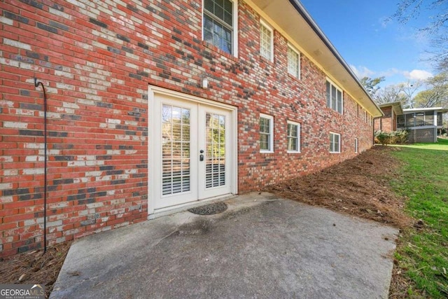 1505 Robinhood Trl, Gainesville, GA 30501 - entrance to property with a patio area, brick siding, and french doors