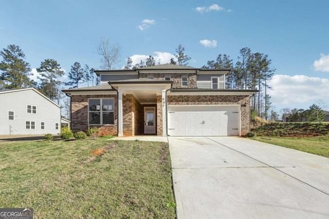 prairie-style house featuring brick siding, a front yard, driveway, and an attached garage