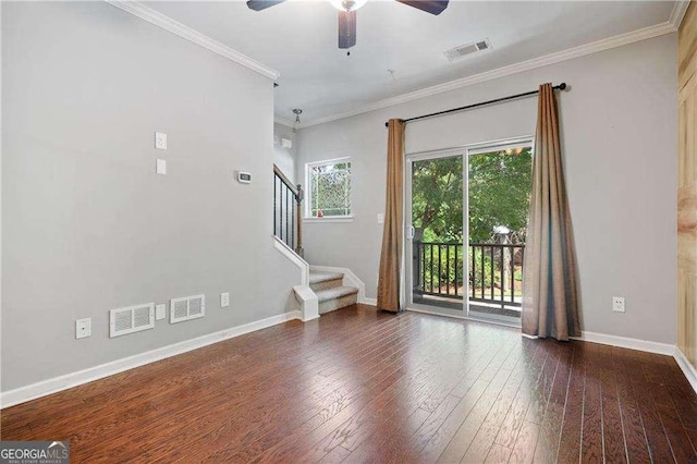 unfurnished living room featuring wood-type flooring, crown molding, ceiling fan, and visible vents