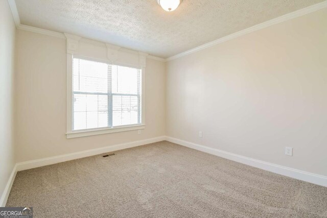 3543 Benthollow Way, Duluth, GA 30096 - carpeted empty room with visible vents, crown molding, baseboards, and a textured ceiling
