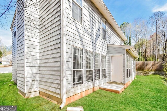3543 Benthollow Way, Duluth, GA 30096 - view of side of home featuring fence and a yard