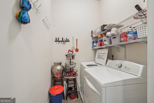 2220 Stirling Bridge Rd, Cumming, GA 30041 - clothes washing area featuring washer and dryer and laundry area