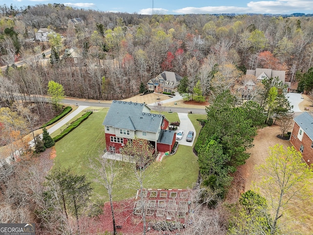 2220 Stirling Bridge Rd, Cumming, GA 30041 - drone / aerial view featuring a wooded view