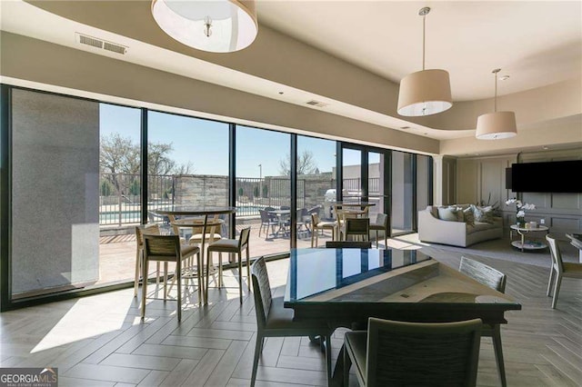 dining space with visible vents