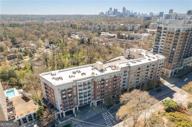 drone / aerial view with a view of city