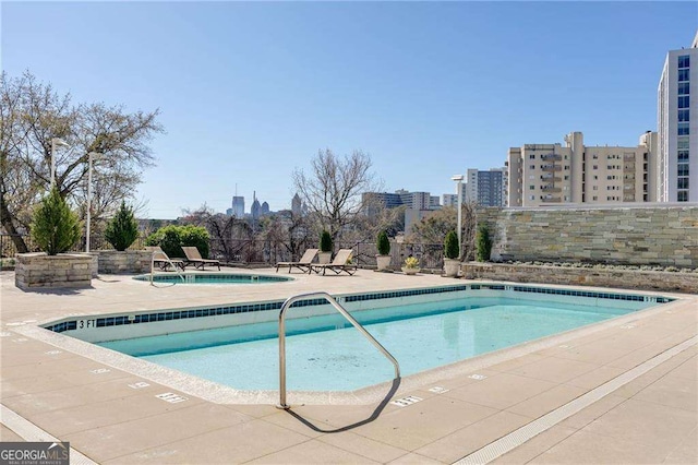 2277 Peachtree Rd NE Unit 608, Atlanta, GA 30309 - community pool with a patio and a city view