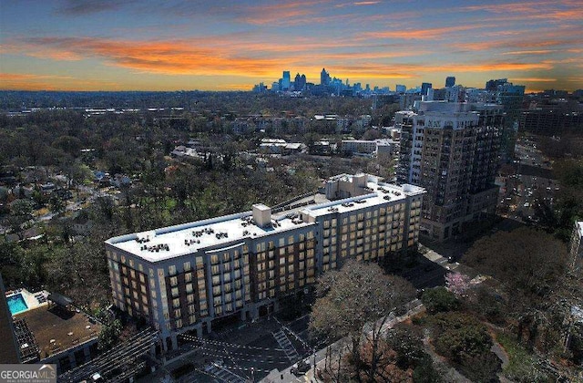 birds eye view of property featuring a view of city