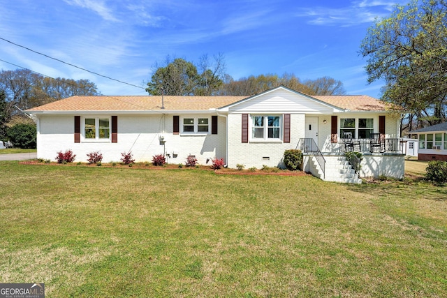 single story home with covered porch, brick siding, a front lawn, and crawl space