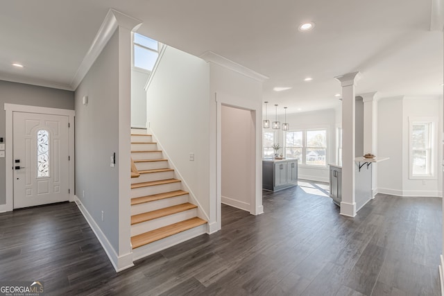 foyer featuring crown molding, stairway, recessed lighting, dark wood-type flooring, and baseboards