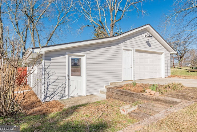 garage with driveway