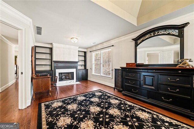 3795 Duckcove Way, Cumming, GA 30041 - living area featuring a premium fireplace, baseboards, wood finished floors, and crown molding