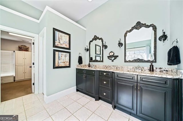 3795 Duckcove Way, Cumming, GA 30041 - bathroom featuring double vanity, baseboards, and tile patterned floors