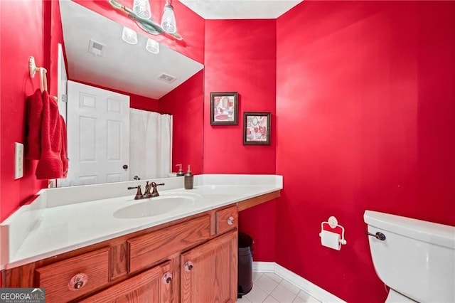 3795 Duckcove Way, Cumming, GA 30041 - bathroom with toilet, vanity, tile patterned flooring, and baseboards