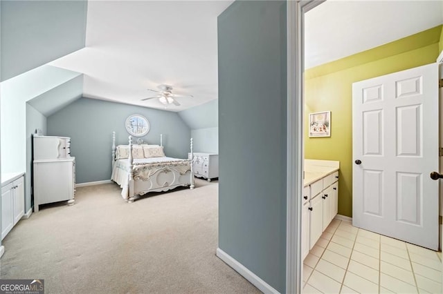 3795 Duckcove Way, Cumming, GA 30041 - bedroom with vaulted ceiling, light carpet, a ceiling fan, ensuite bath, and baseboards