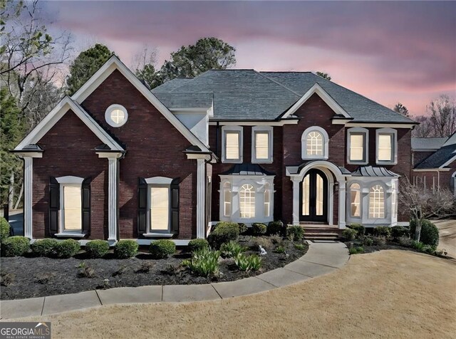 3795 Duckcove Way, Cumming, GA 30041 - view of front of home featuring brick siding and roof with shingles