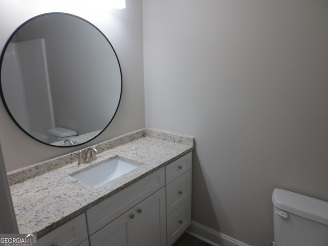 505 Palomino Ln, Warner Robins, GA 31088 - half bathroom featuring toilet and vanity