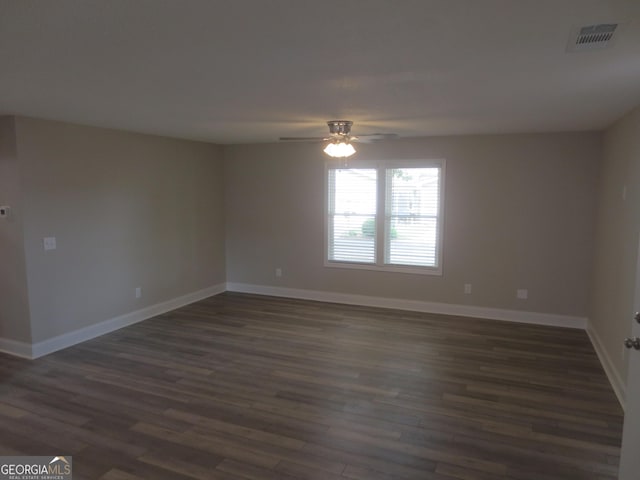 505 Palomino Ln, Warner Robins, GA 31088 - empty room with a ceiling fan, dark wood-style flooring, and baseboards