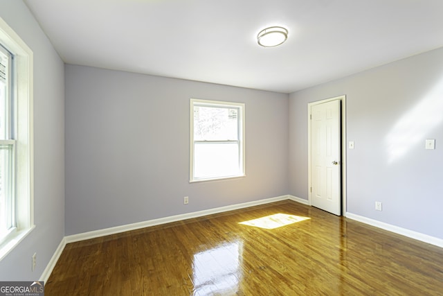 2666 Frontier Trl, Atlanta, GA 30341 - spare room featuring baseboards and wood finished floors