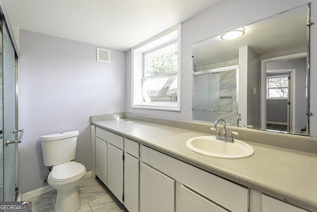 2666 Frontier Trl, Atlanta, GA 30341 - bathroom with a shower stall, marble finish floor, visible vents, toilet, and vanity