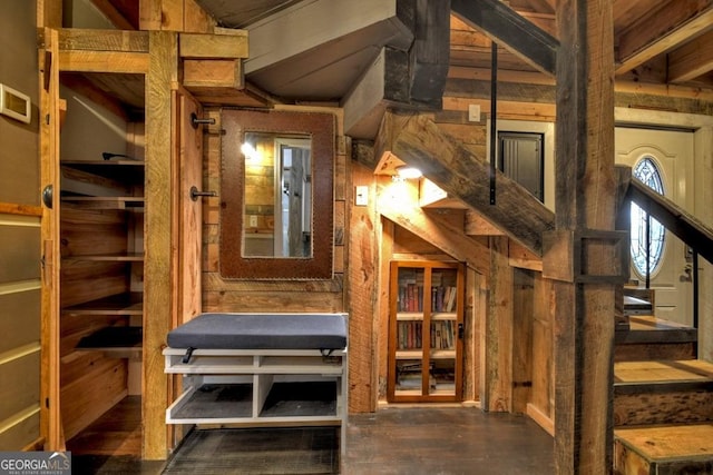 stairway featuring wood finished floors