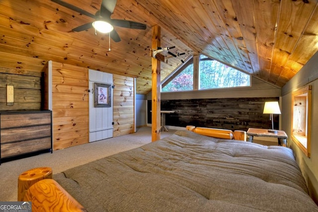 bedroom with carpet, lofted ceiling, wood walls, and wood ceiling