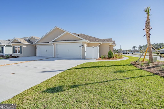 114 Richard Lee Dr, Kingsland, GA 31548 - single story home with stucco siding, an attached garage, driveway, and a front yard